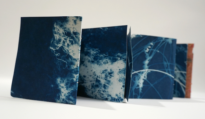 "Chiasma/Reflecting" double-sided cyanotypes on cotton paper, with cover of kozo and cotton construction paper, $400
