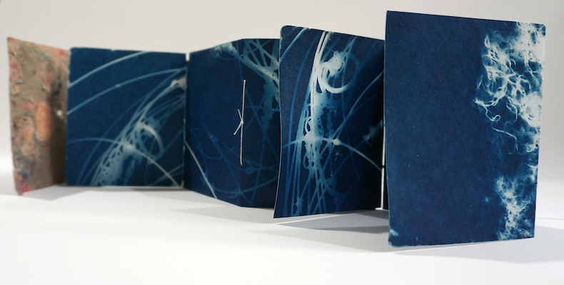 "Chiasma/Reflecting" double-sided cyanotypes on cotton paper, with cover of kozo and cotton construction paper, $400