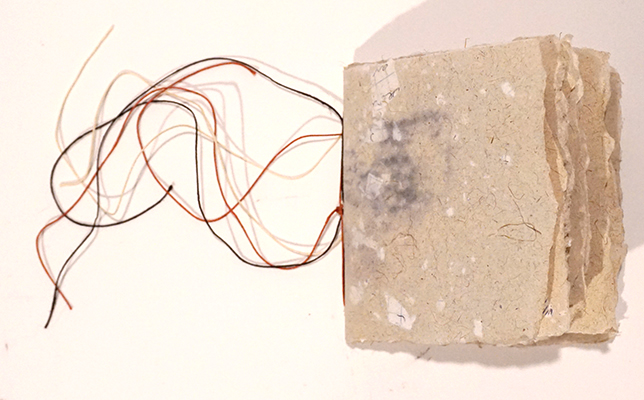 "Map of Where I've Been", handmade paper of lomandra, abaca, and purged notebook pages; ink and watercolor on notebook fragments, thread, $400