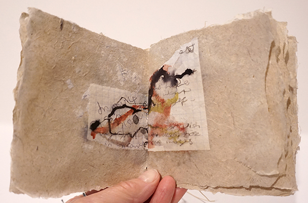 "Map of Where I've Been", handmade paper of lomandra, abaca, and purged notebook pages; ink and watercolor on notebook fragments, thread, $400